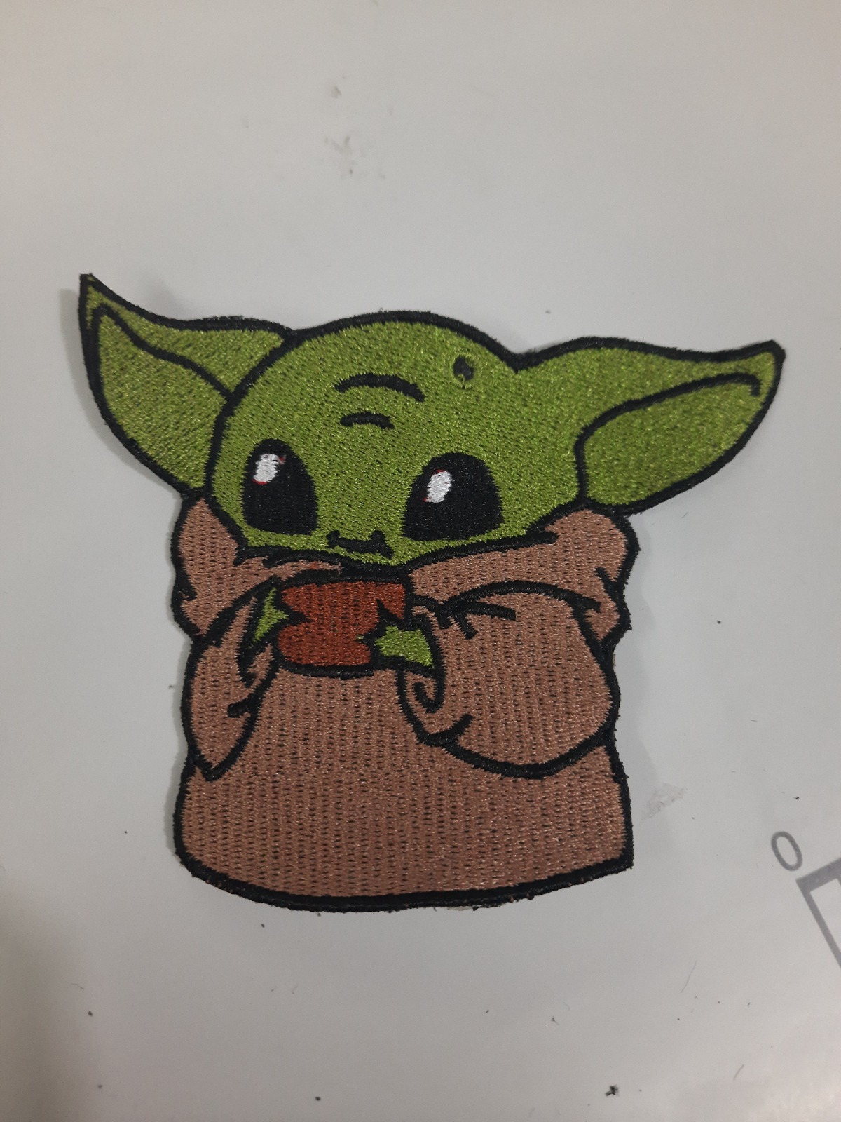Parche bordado de personaje verde