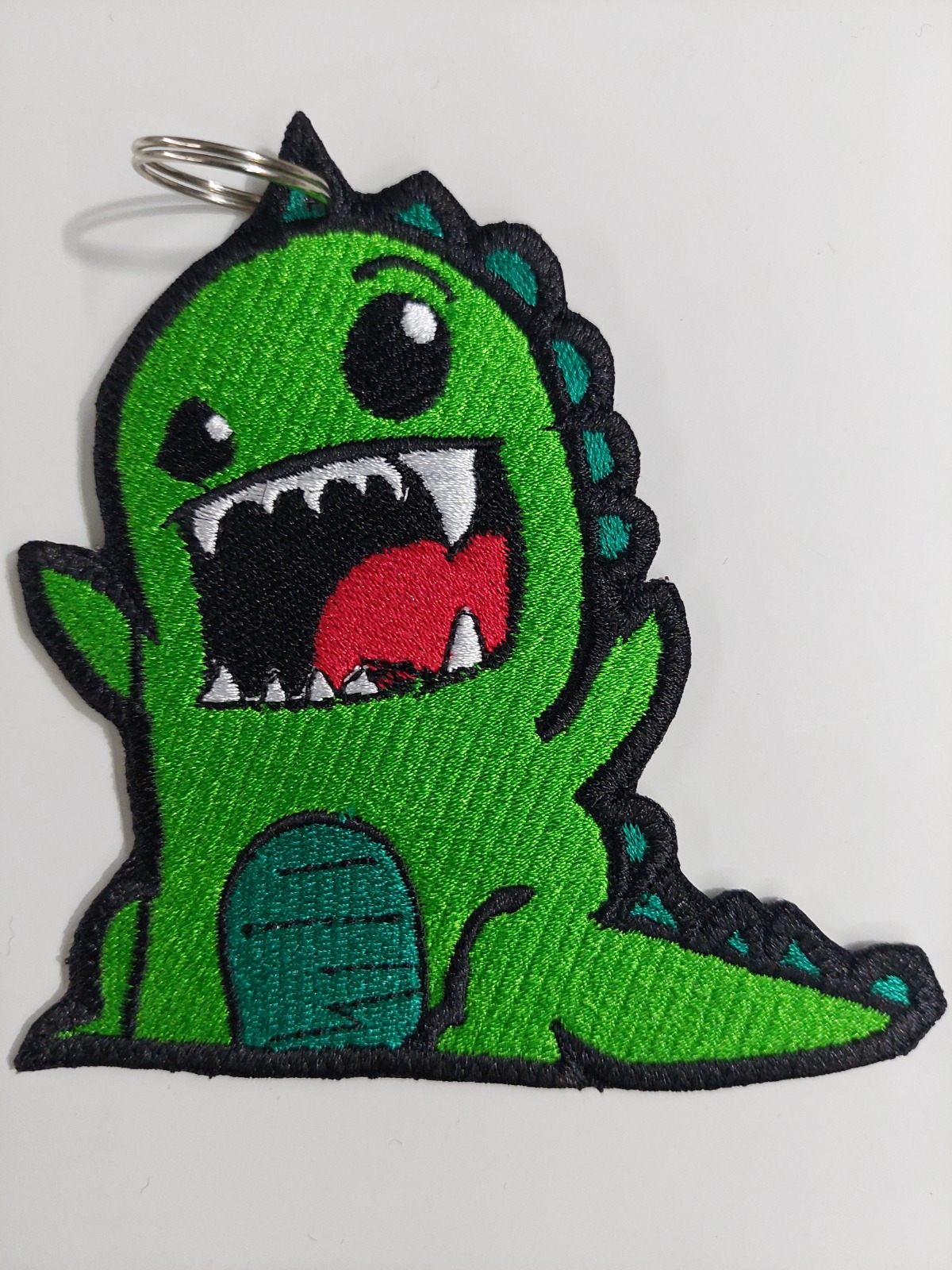 Parche bordado de dinosaurio